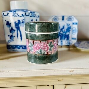 Oriental style canister with floral design
